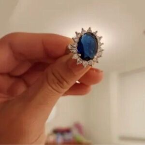 Blue Oval Crystal Halo Ring – Sterling Silver